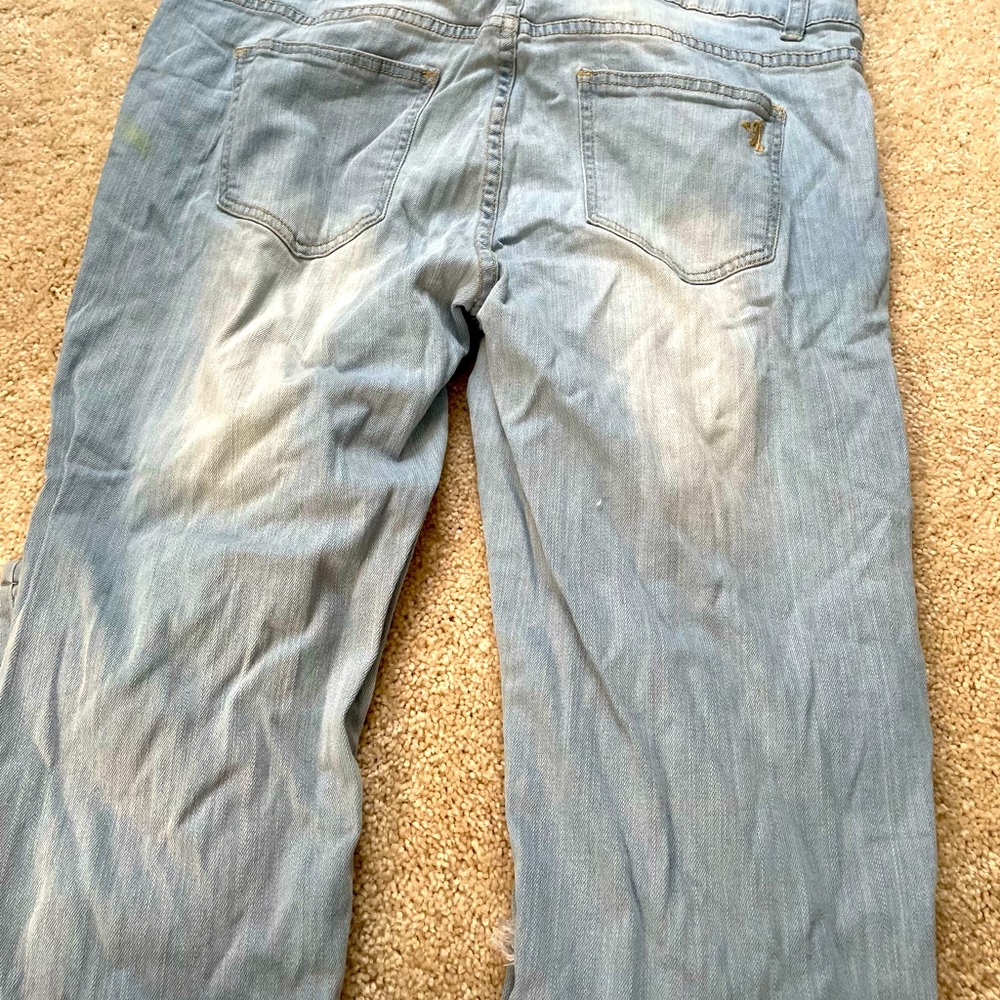 Women’s distressed jeans ( never worn)